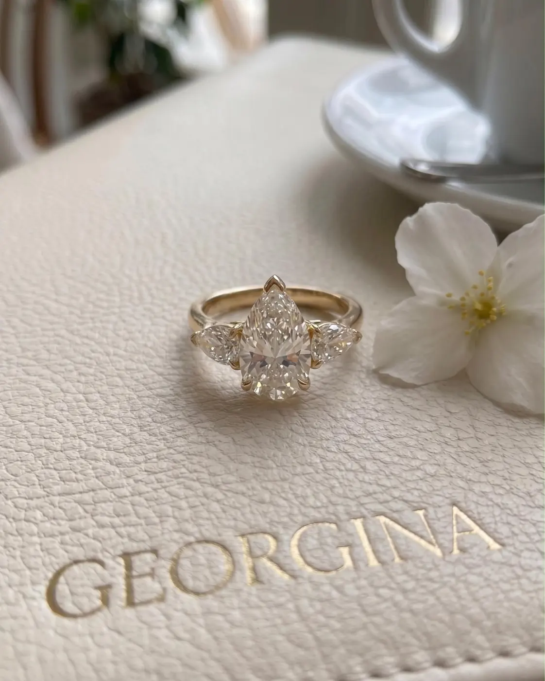 Pear-cut diamond ring